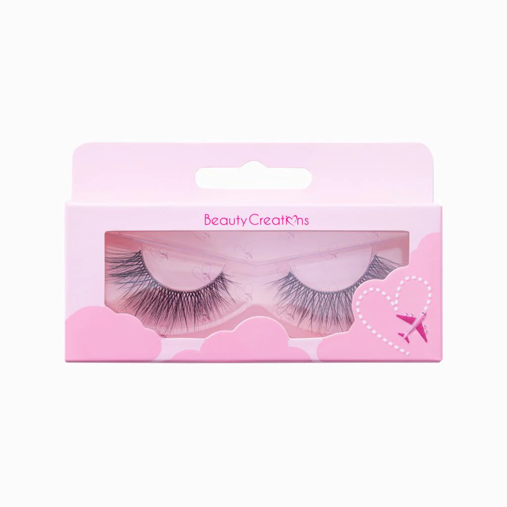 Pink packaging of false eyelashes with 'Beauty Creations' branding on a white background
